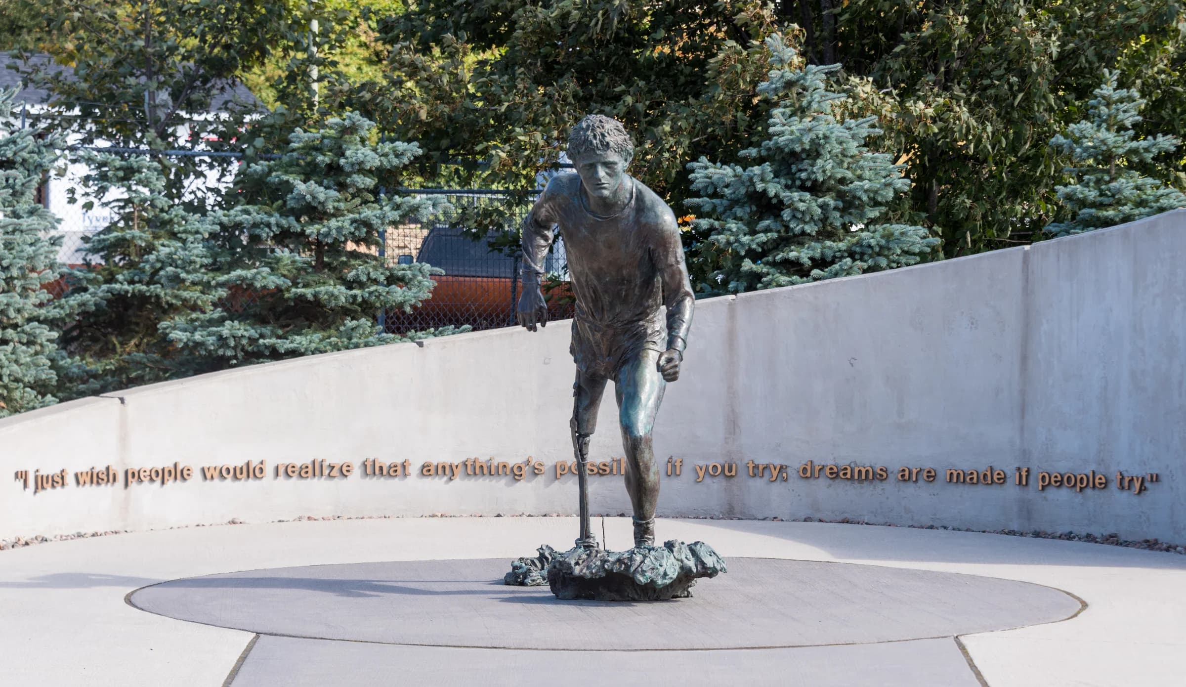 Bronze statue of Terry Fox at Mile Zero Memorial Site commemorating the beginning his Marathon of Hope on April 12, 1980, in St. John's, NL Canada. The life-size bronze statue of Terry was created by Canadian sculptor, Luben Boykov and inst