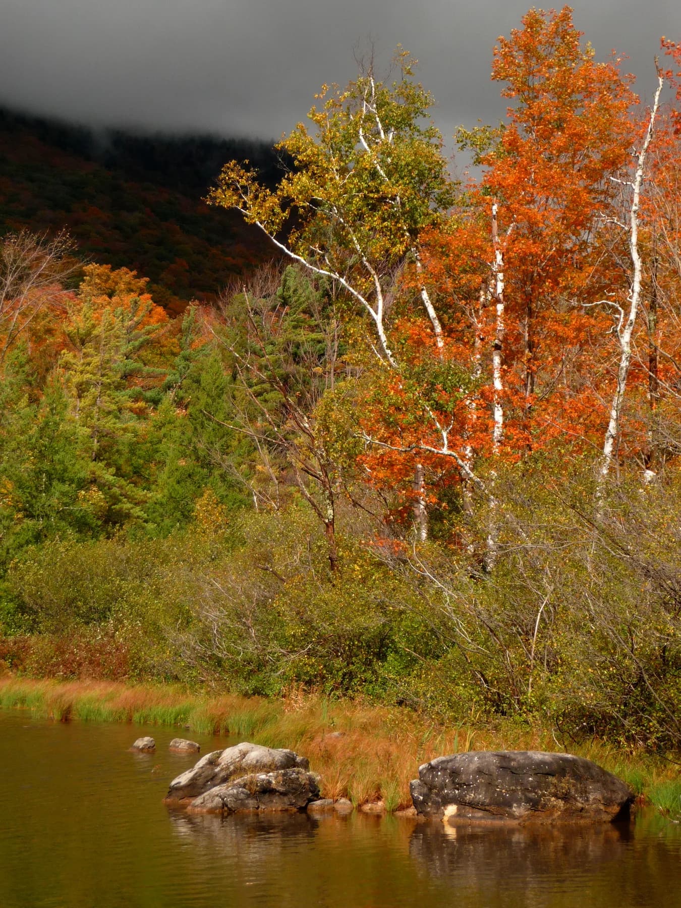 Equinox Pond and autumn foliage in Manchester, Vermont