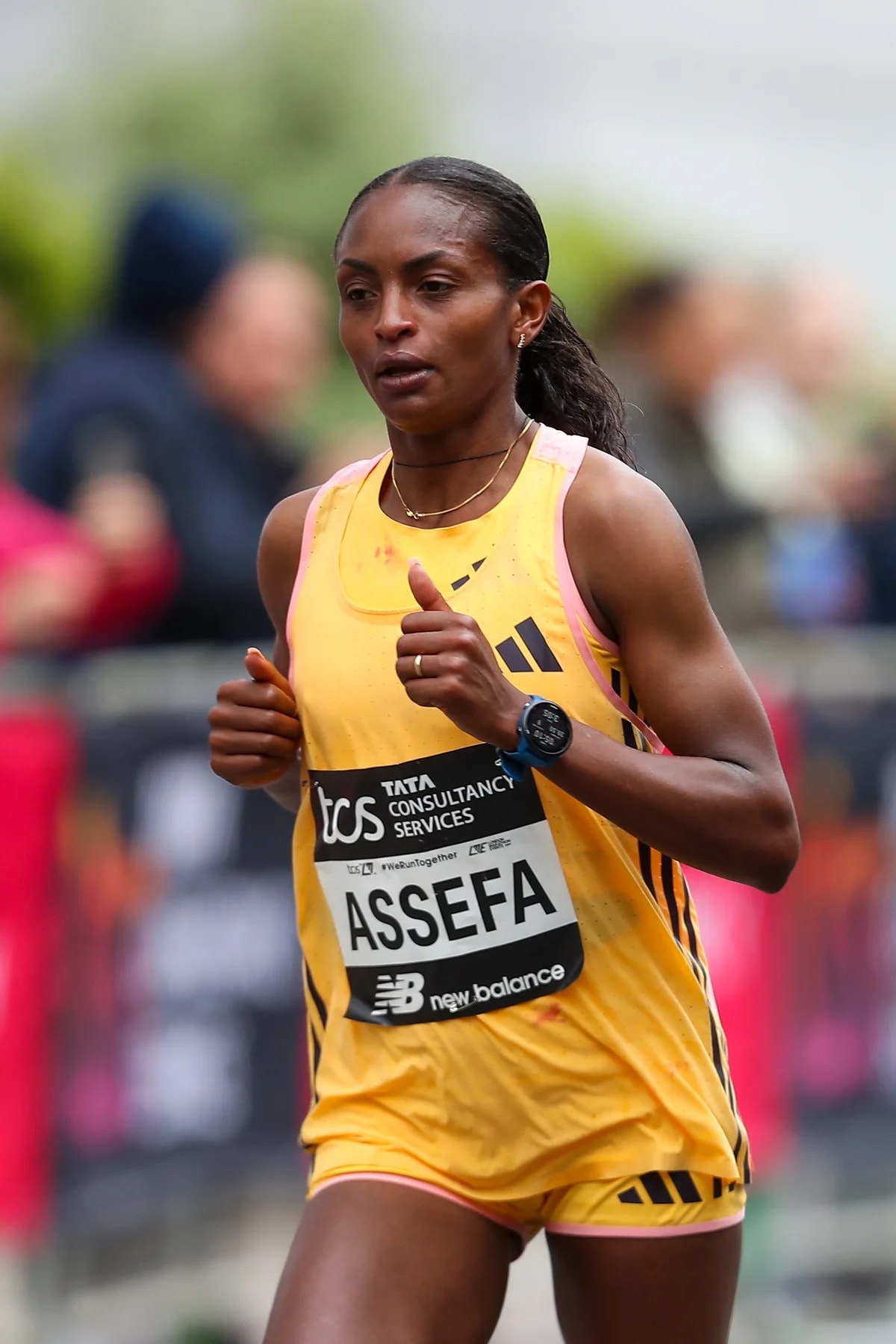Tigst Assefa at the London Marathon, 21 April 2024; athlete portrait, not Berlin 2026