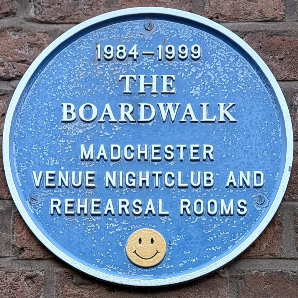 Blue plaque commemorating the Boardwalk music venue in Manchester, photographed in 2024