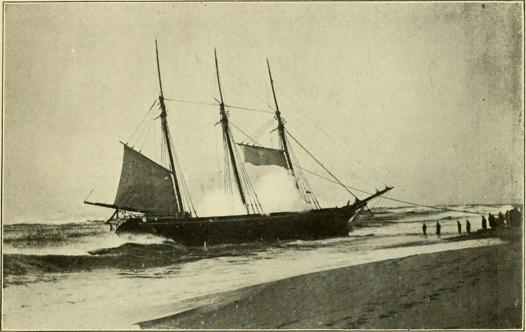 The Warren Sawyer ashore at Surfside after the December 1884 wreck, photographed by Josiah Freeman.