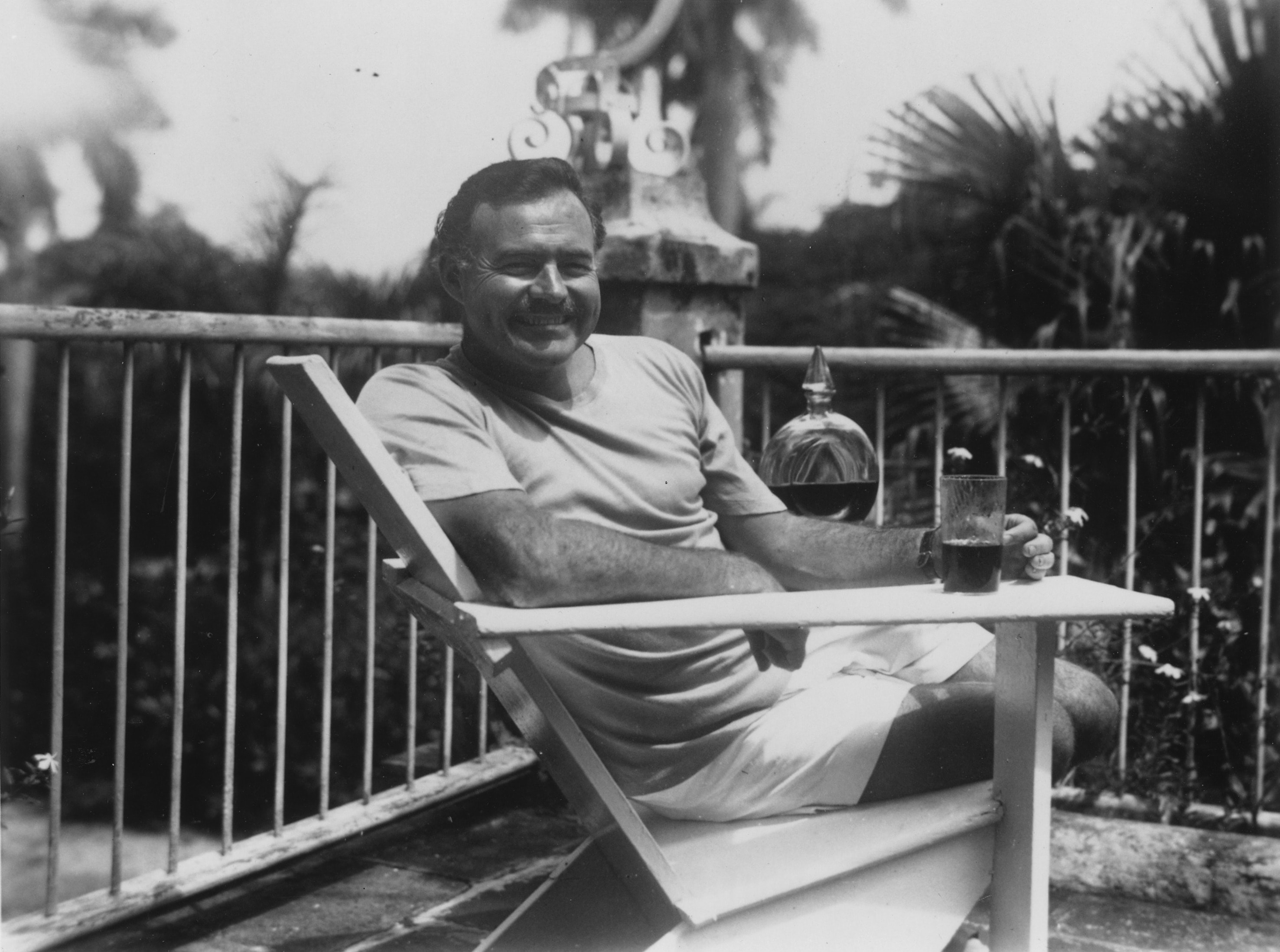 Ernest Hemingway seated at Finca Vigia in Cuba in 1946